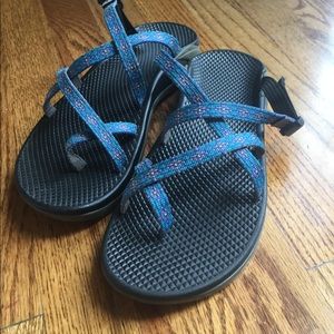 Blue backless chacos